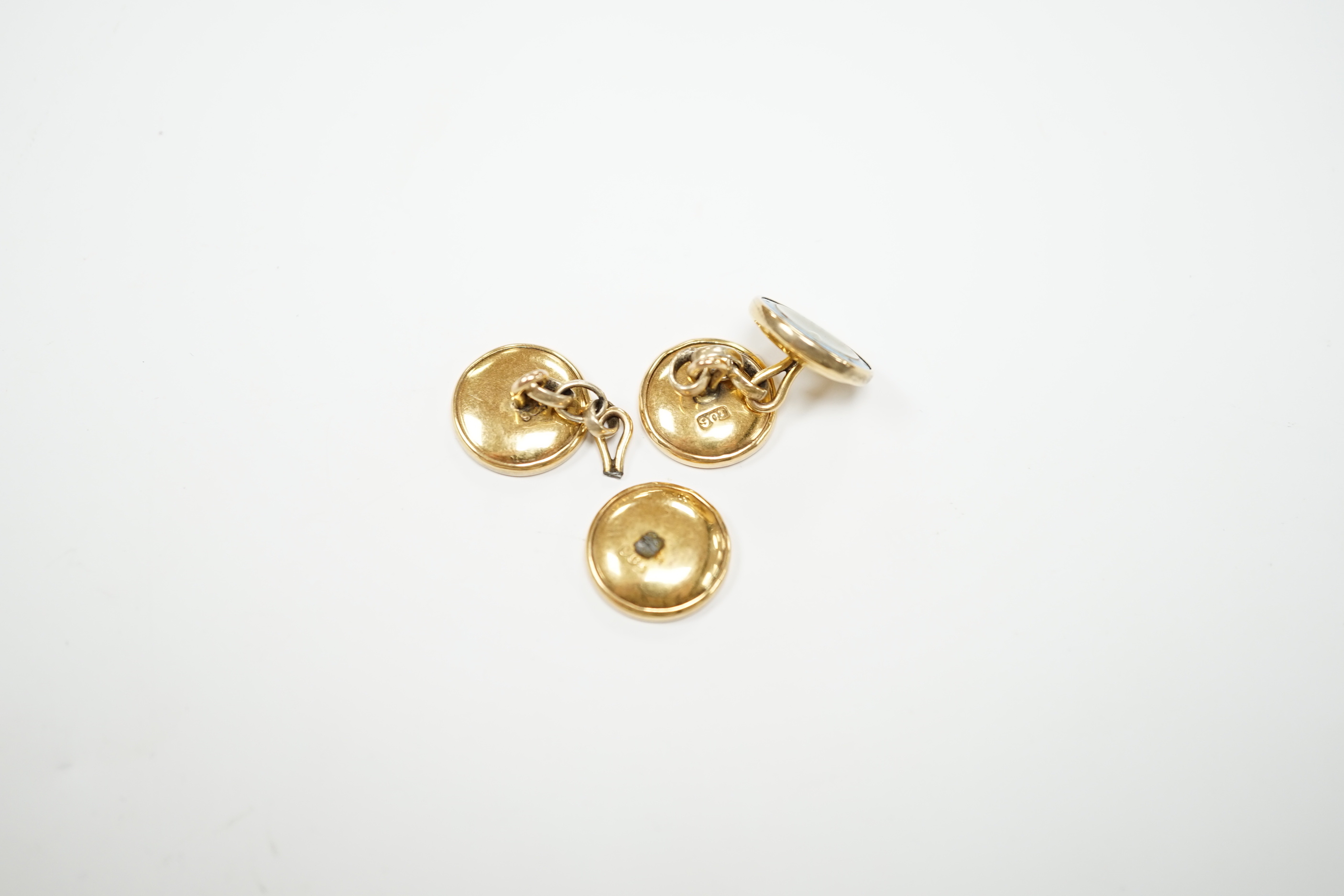 A pair of 9ct, mother of pearl and enamelled circular cufflinks, one link detached, 13mm, gross weight 6.5 grams.